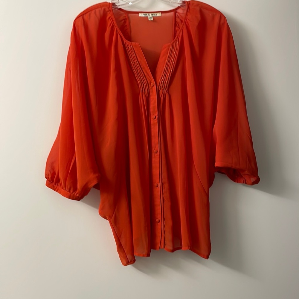 Sheer orange blouse
